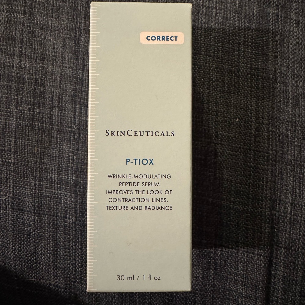 SkinCeuticals P-Tiox Peptide Serum - Cream and Blue Box